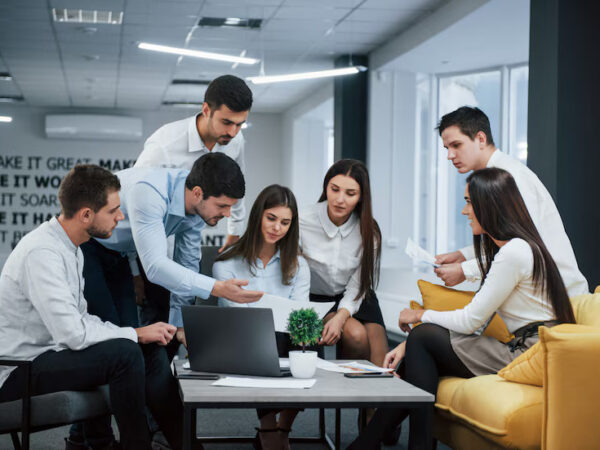 An employee points out a design flaw in a new product to the department manager